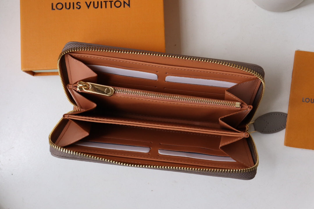 ZIPPY WALLET 19.5 MAHINA LEATHER