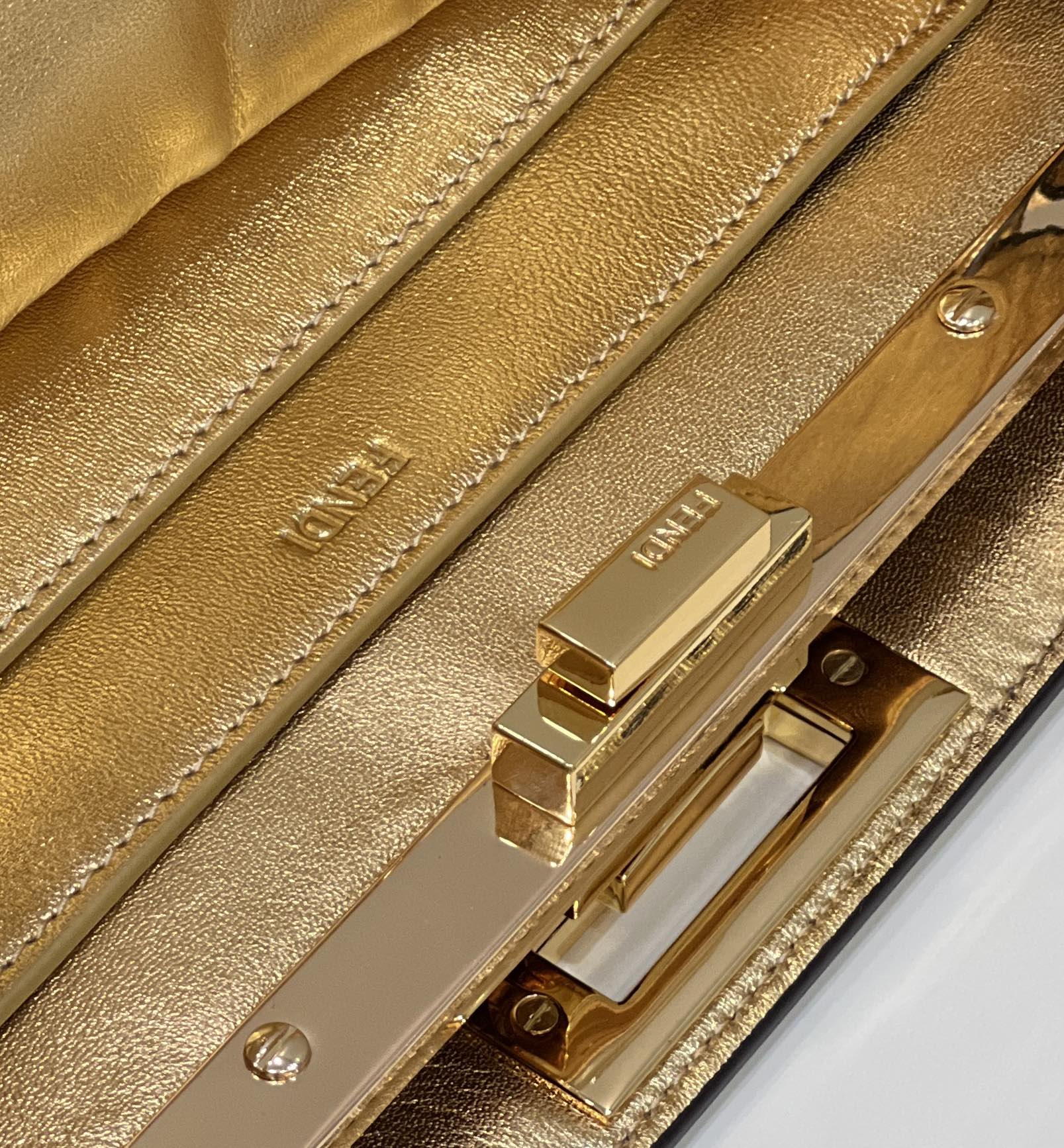 PEEKABOO ISEEU 33 IN GOLD METALLIC CALFSKIN GOLD HARDWARE