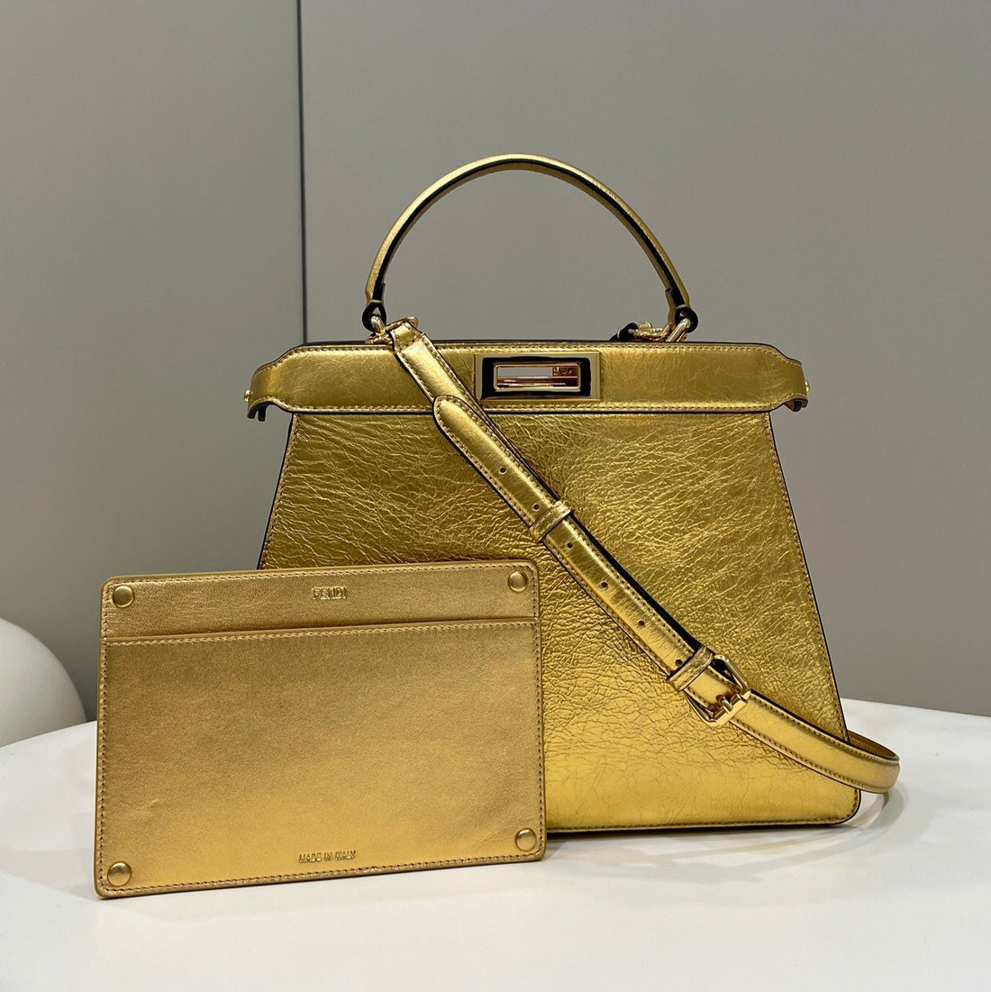 PEEKABOO ISEEU 33 IN GOLD METALLIC CALFSKIN GOLD HARDWARE