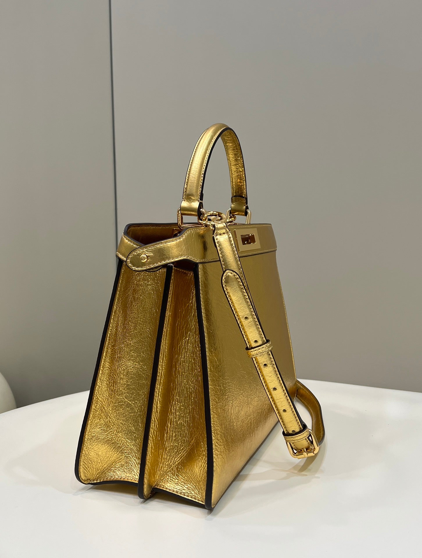 PEEKABOO ISEEU 33 IN GOLD METALLIC CALFSKIN GOLD HARDWARE