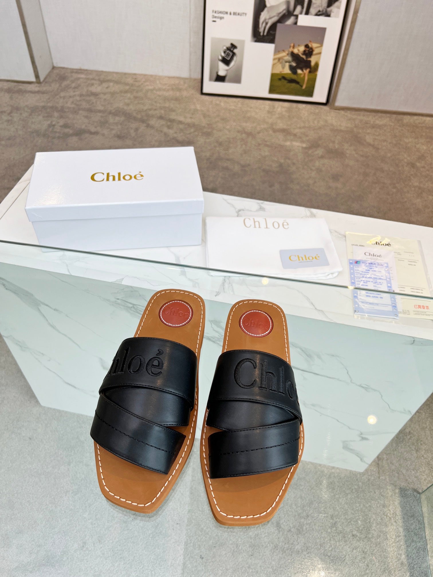 WOODY MULE IN BLACK LAMBSKIN WITH EMBROIDERED LOGO