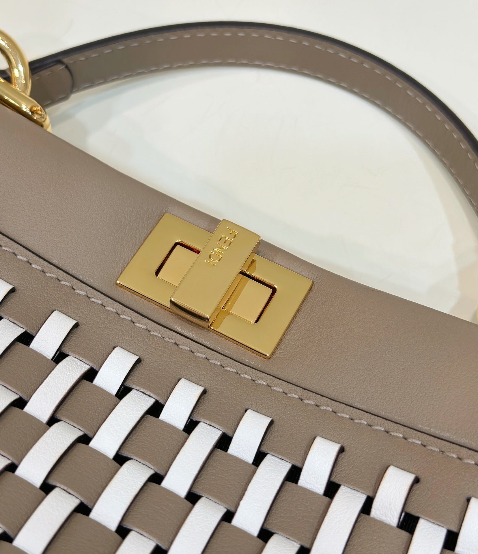 PEEKABOO 24 IN WHITE MIX BROWN INTERLACED CALFSKIN GOLD HARDWARE
