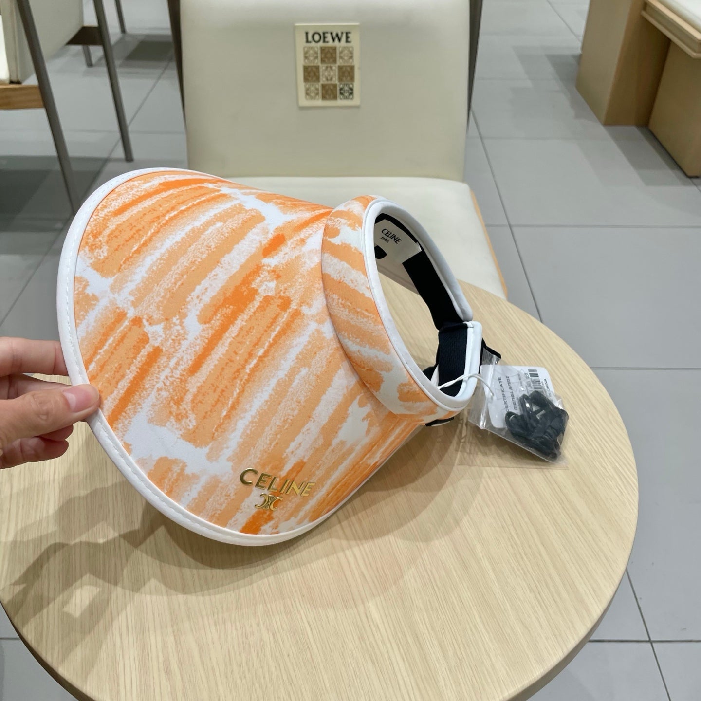 VISOR HAT MODEL 652202 IN ORANGE AND WHITE FABRIC