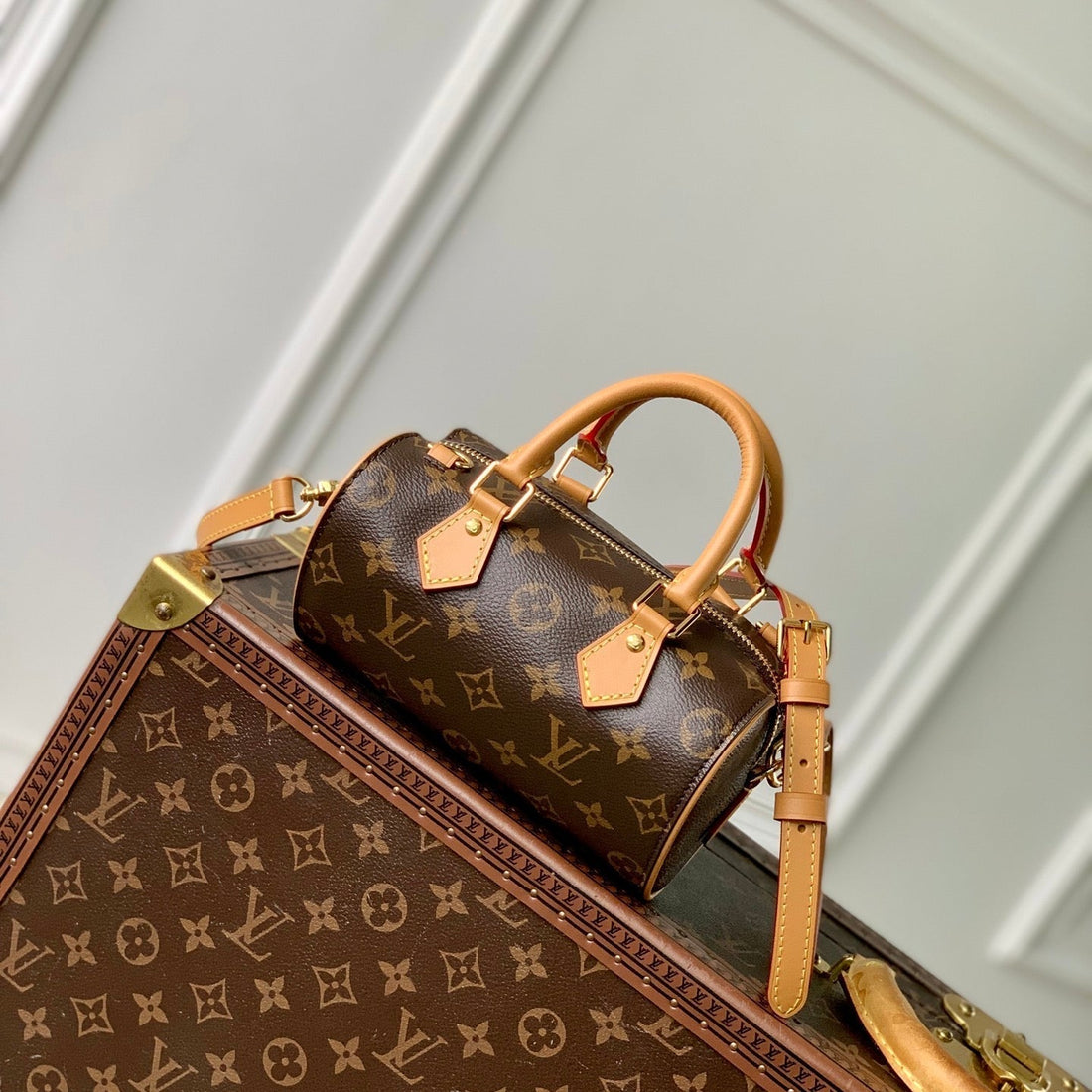 NANO SPEEDY DATING 18 IN BROWN COATED CANVAS GOLD HARDWARE