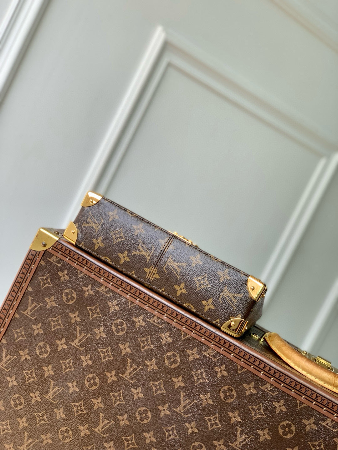 TRUNKIE 27 IN BROWN COATED CANVAS BLACK CALFSKIN SIGNATURE S-LOCK