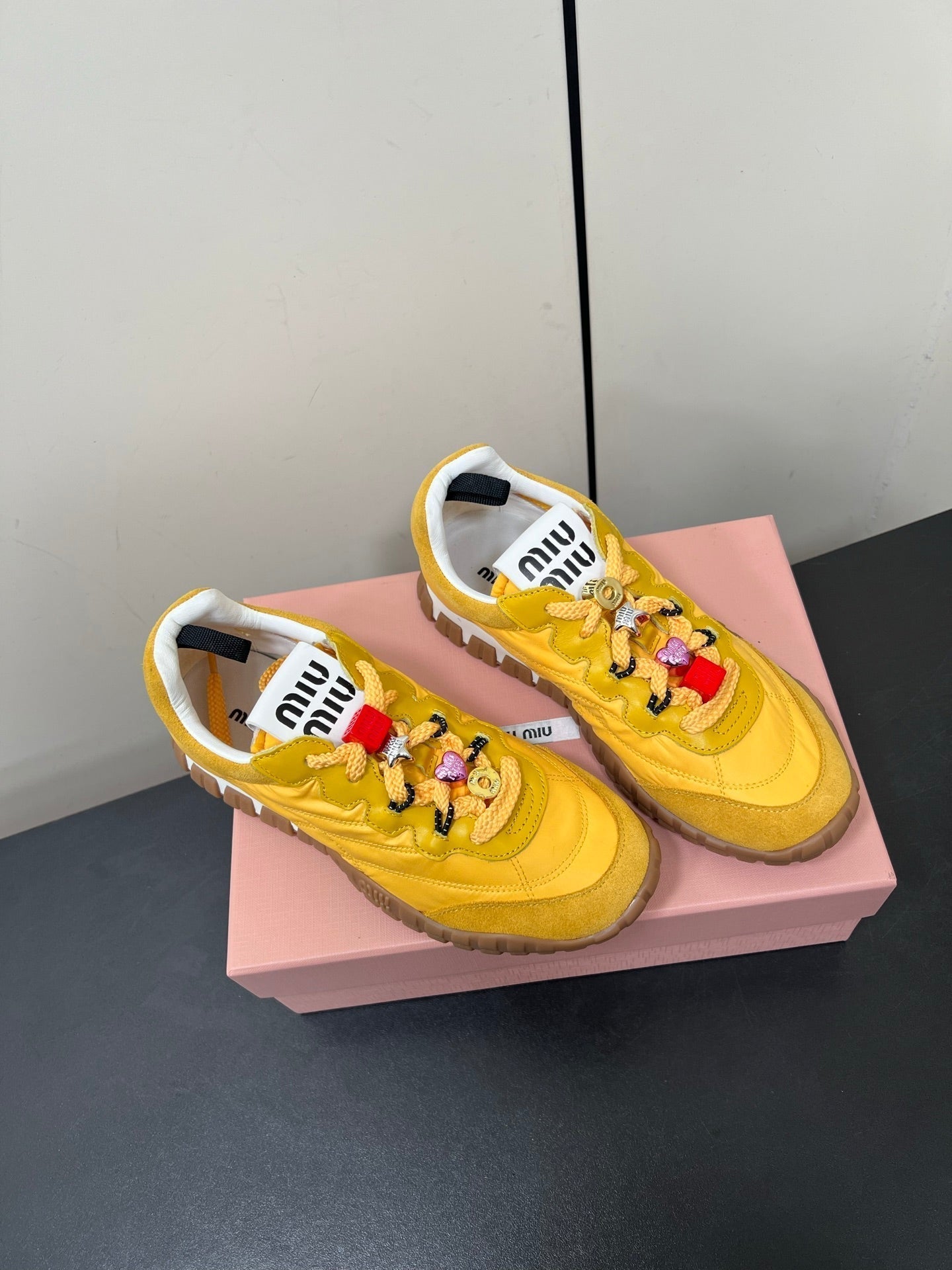 TYRE SNEAKERS IN YELLOW TECHNICAL FABRIC AND SUEDE WITH STICKER