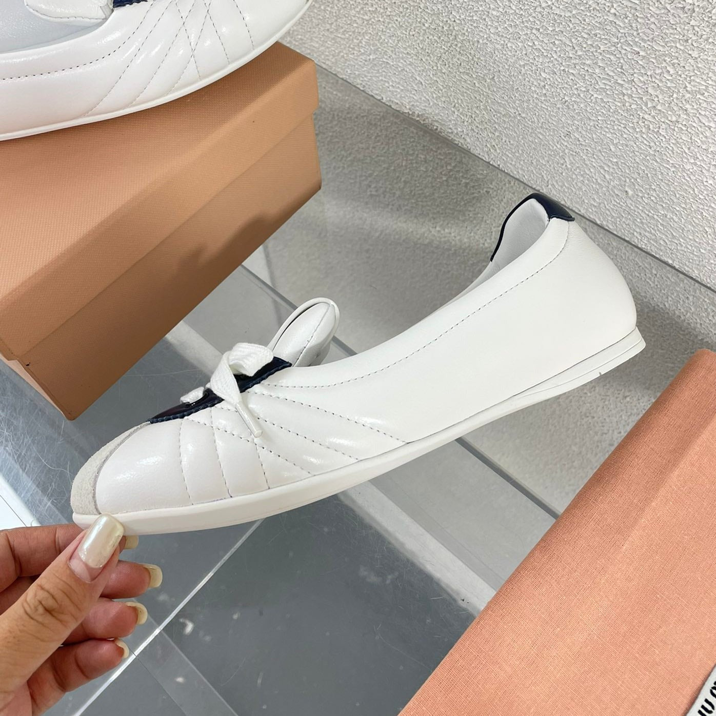 White Leather Ballet Flats With Black