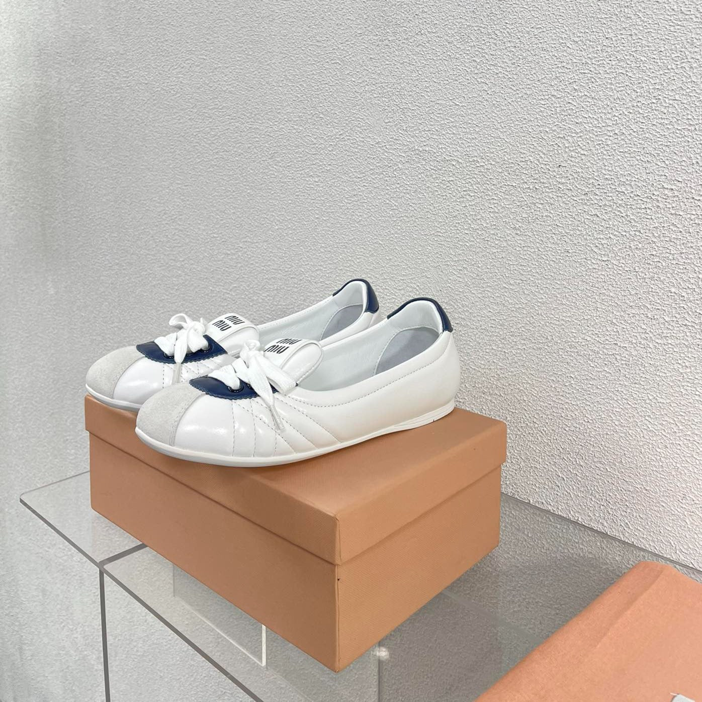 White Leather Ballet Flats With Black