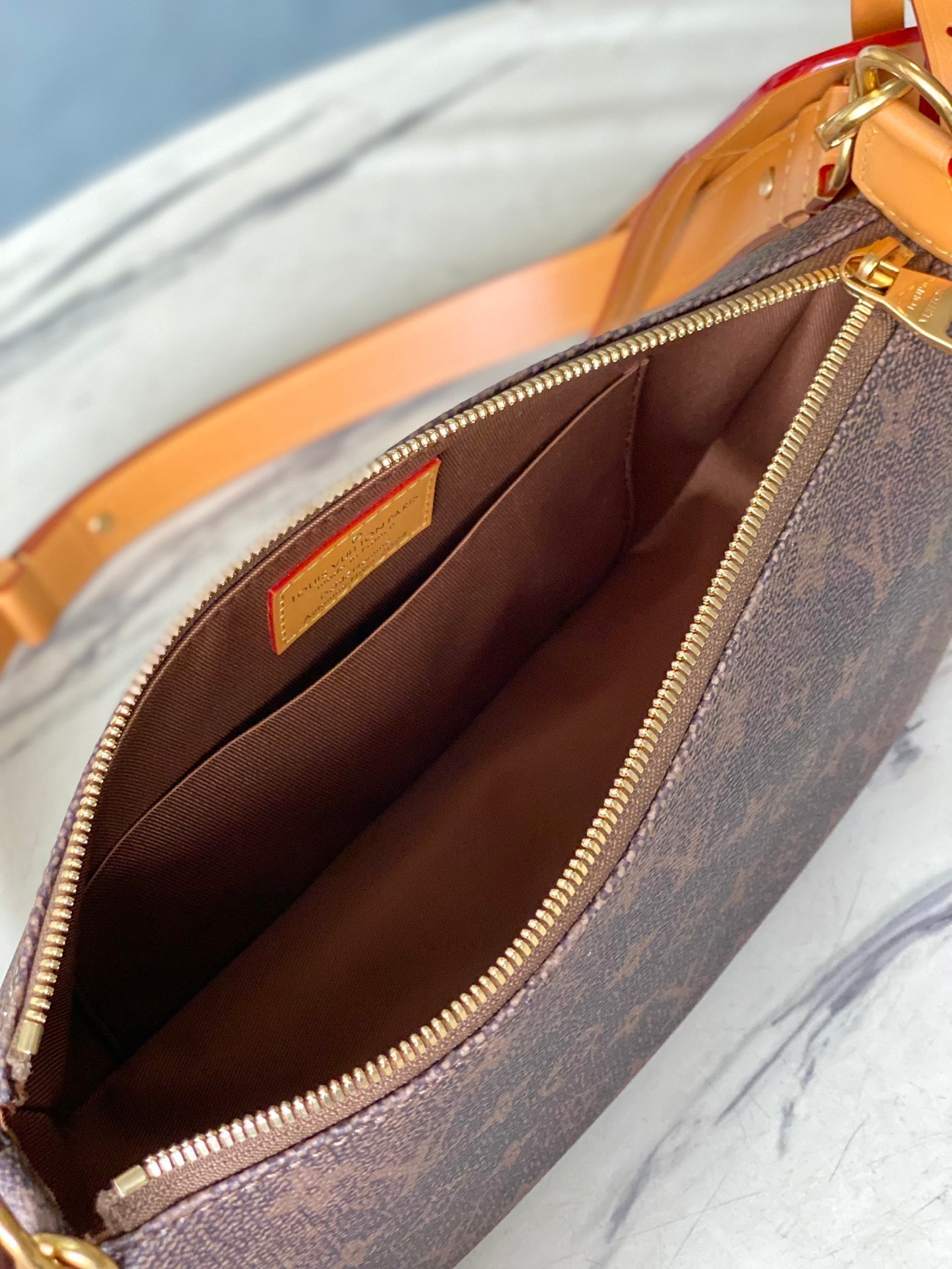 POCHETTE ACCESSOIRE XL 28 IN BROWN MONOGRAM DUST CANVAS