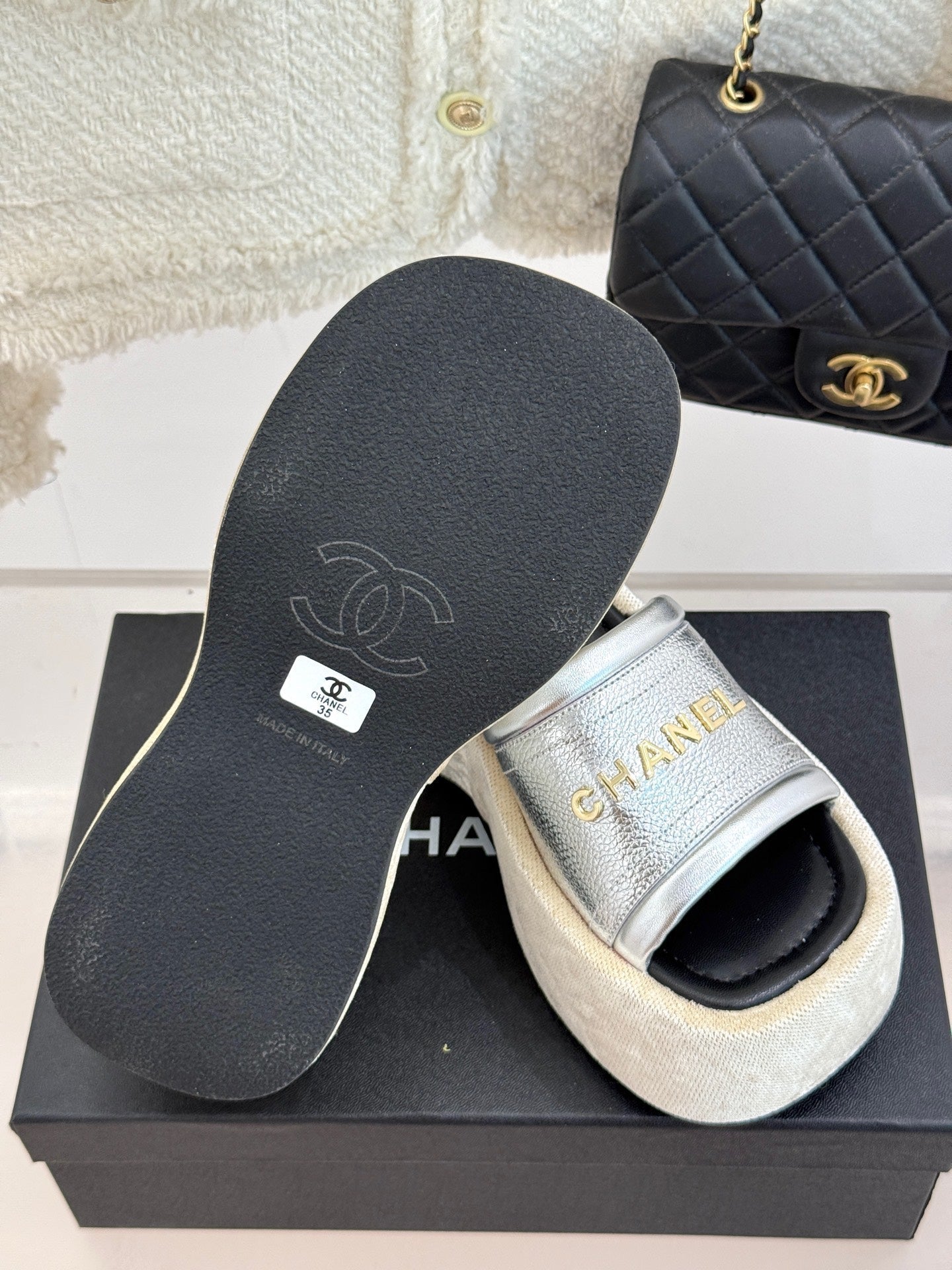 PLATFORM SLIPPERS IN SILVER LAMBSKIN