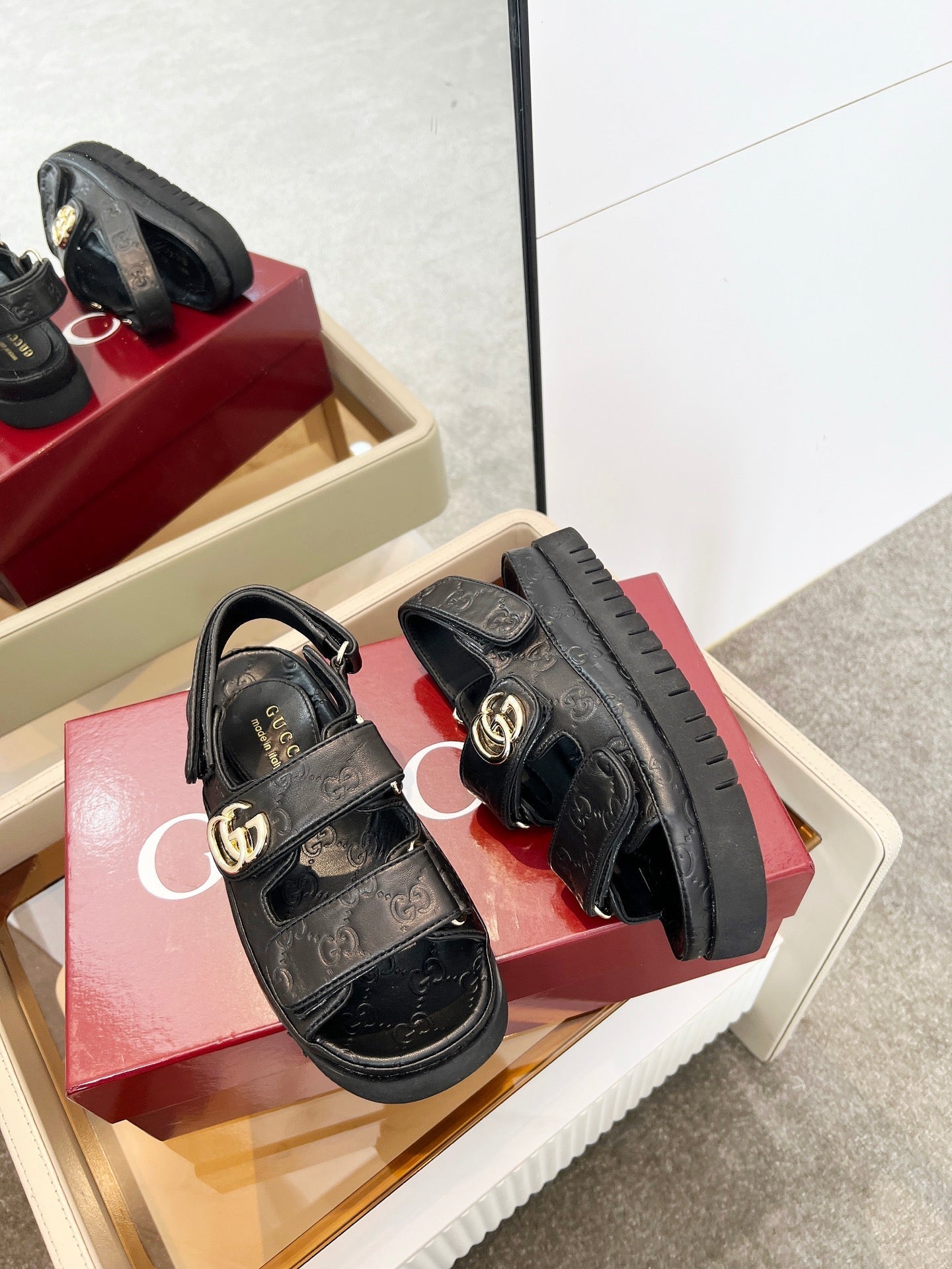 VELCRO STRAP SANDALS IN BLACK EMBOSSED LOGO LAMBSKIN GOLD HARDWARE